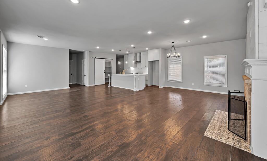 2001 Colcord Avenue Waco, TX 76707 - Photo 4 of 27 a view of kitchen with furniture and wooden floor
