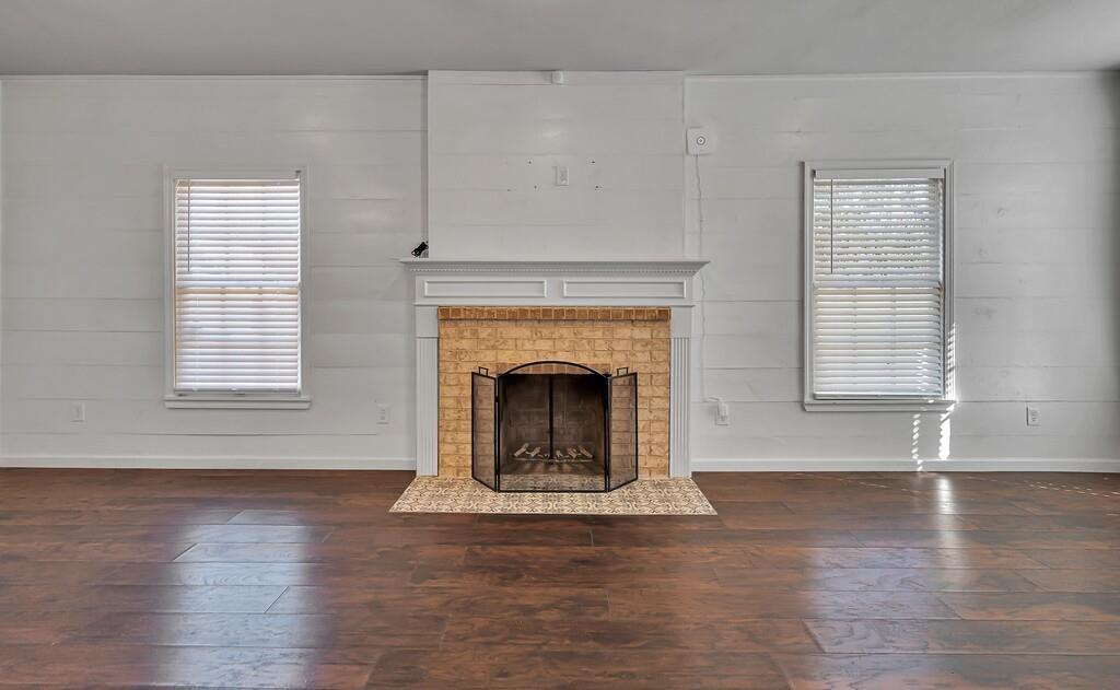 2001 Colcord Avenue Waco, TX 76707 - Photo 5 of 27 a view of a livingroom with a fireplace and window