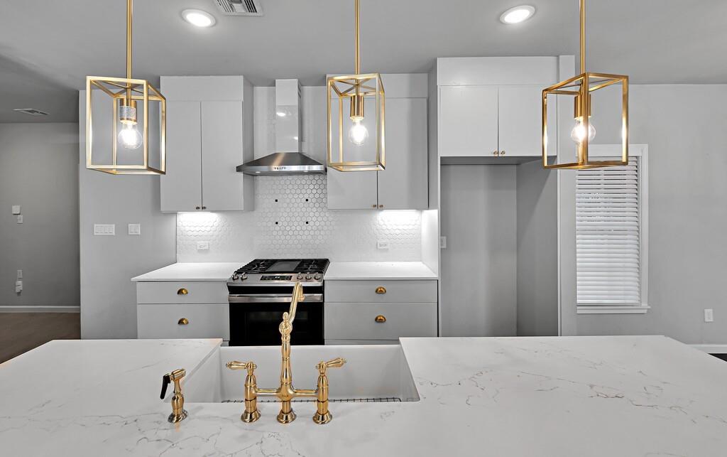 2001 Colcord Avenue Waco, TX 76707 - Photo 8 of 27 a kitchen with a sink stainless steel appliances and cabinets