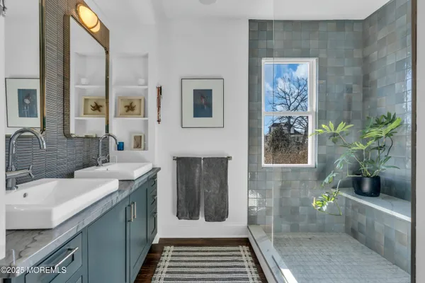 a bathroom with a sink and a bathtub