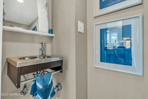 a room with a table and cabinets