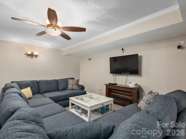 a living room with furniture and a couch