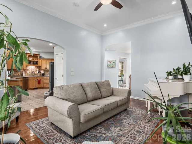 a living room with furniture and a rug