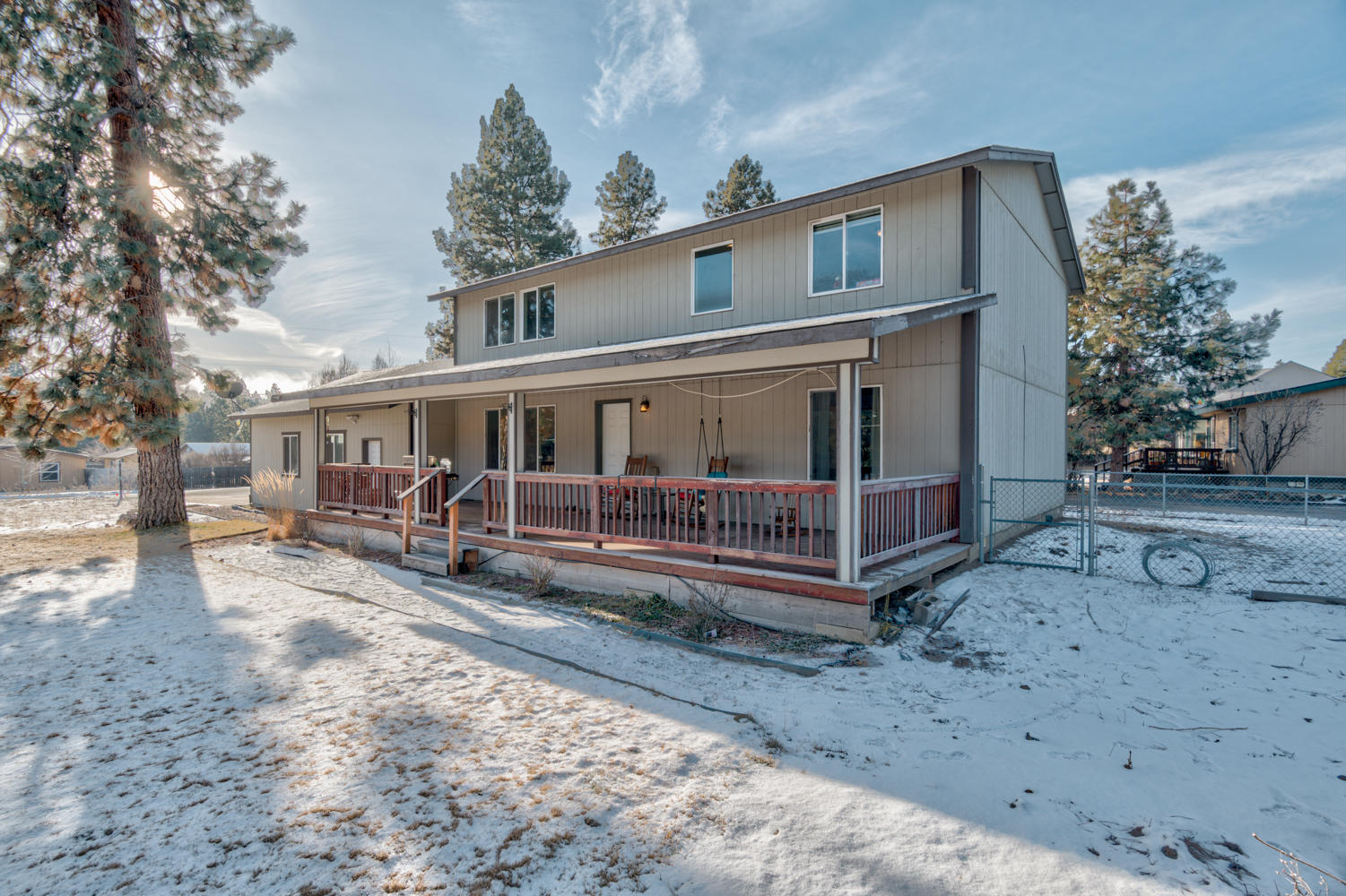 19660 Apache Road Bend, OR 97702 - Photo 1 of 33 a view of a house with backyard and sitting area