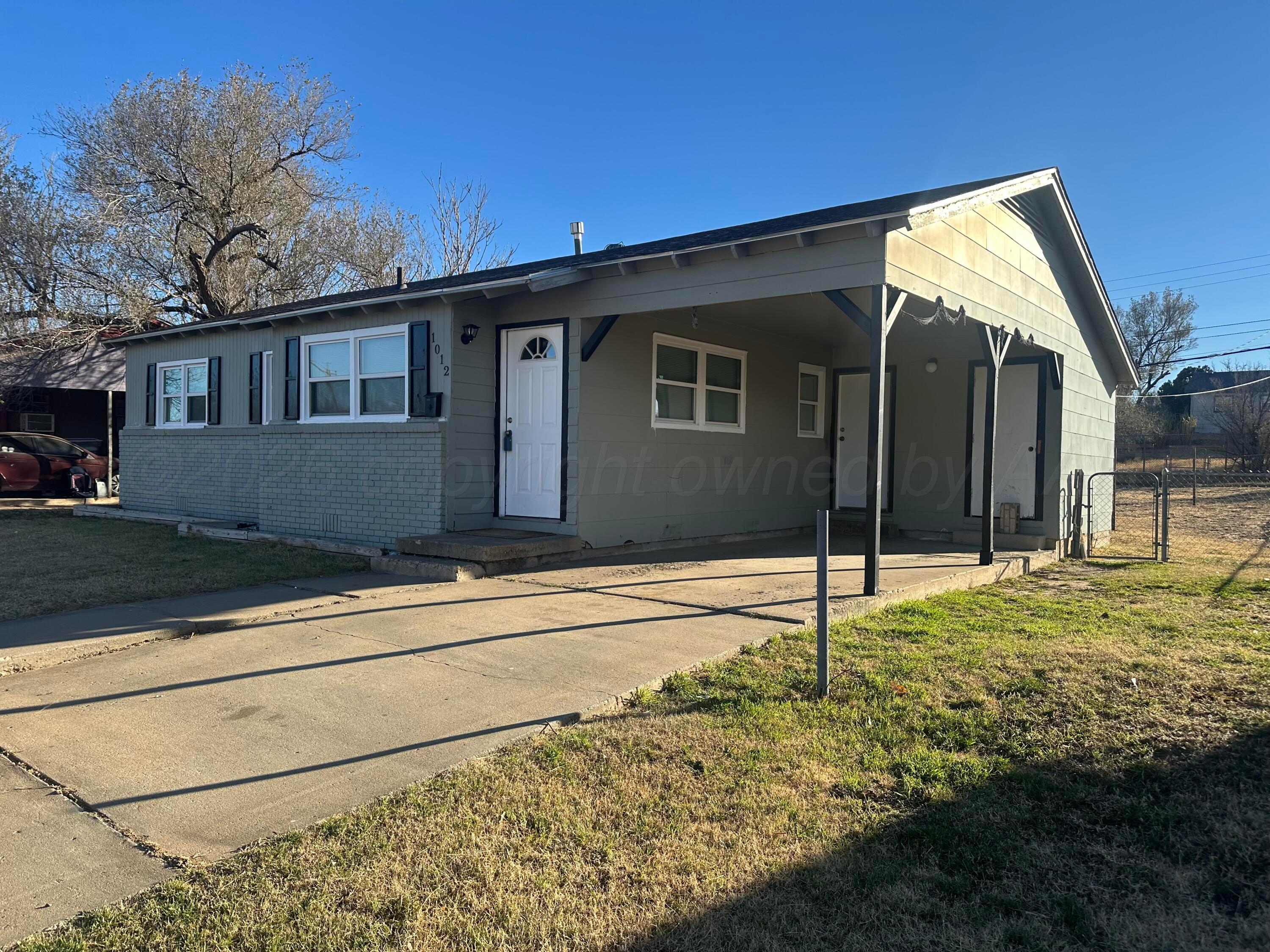 1012 Harper Street Amarillo, TX 79107 - Photo 18 of 24 a house view with a backyard space