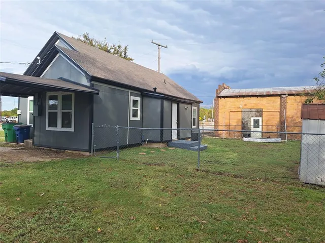 a house view with a garden space