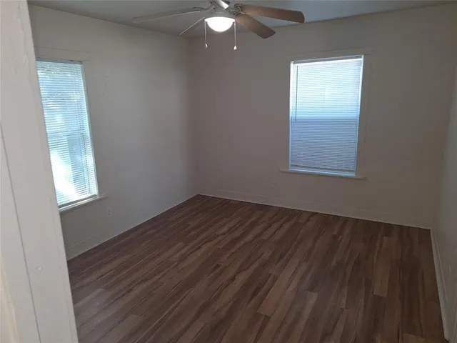 an empty room that has a window