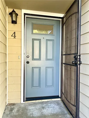 a kitchen with a sink and a window