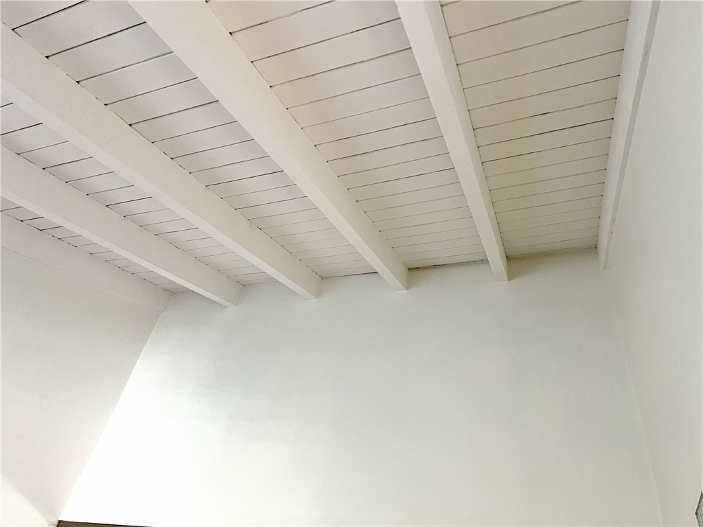 4 Latitude Court Newport Beach, CA 92663 - Photo 21 of 41 Vaulted and beam ceiling