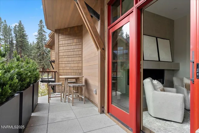 a backyard of a house with outdoor seating