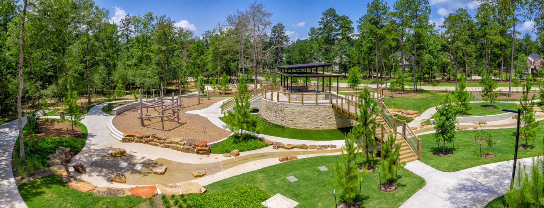 520 Red Cascade Trail Willis, TX 77318 - Photo 23 of 27 a view of a swimming pool with a garden