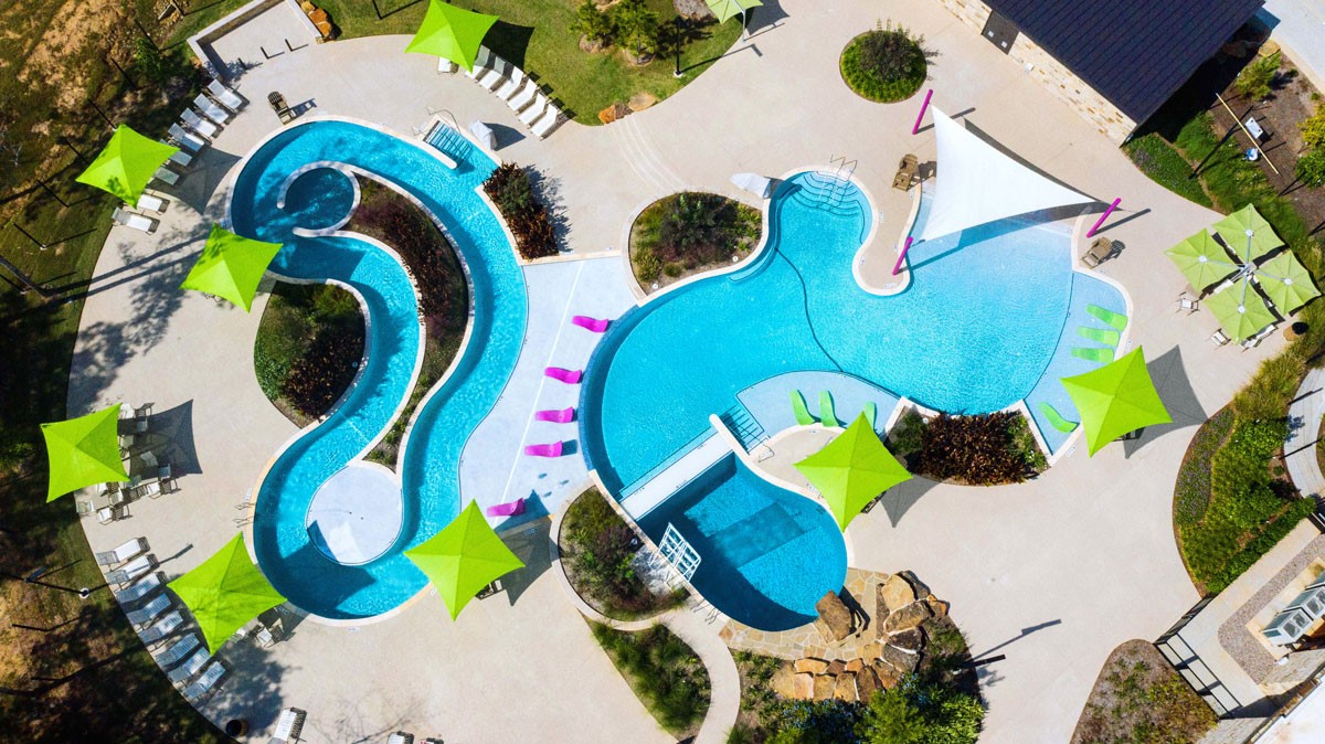 520 Red Cascade Trail Willis, TX 77318 - Photo 25 of 27 an aerial view of a swimming pool