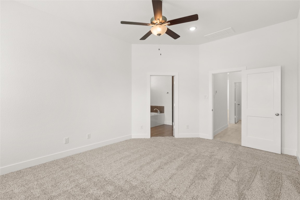 520 Red Cascade Trail Willis, TX 77318 - Photo 8 of 27 a view of a big room with carpet