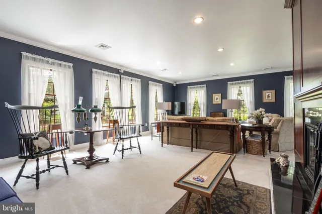 a view of a livingroom with furniture window and outside view