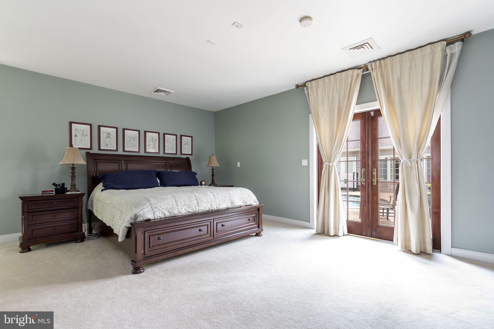 80 Linvale Road Ringoes, NJ 08551 - Photo 22 of 47 a bed sitting in a bedroom next to a window