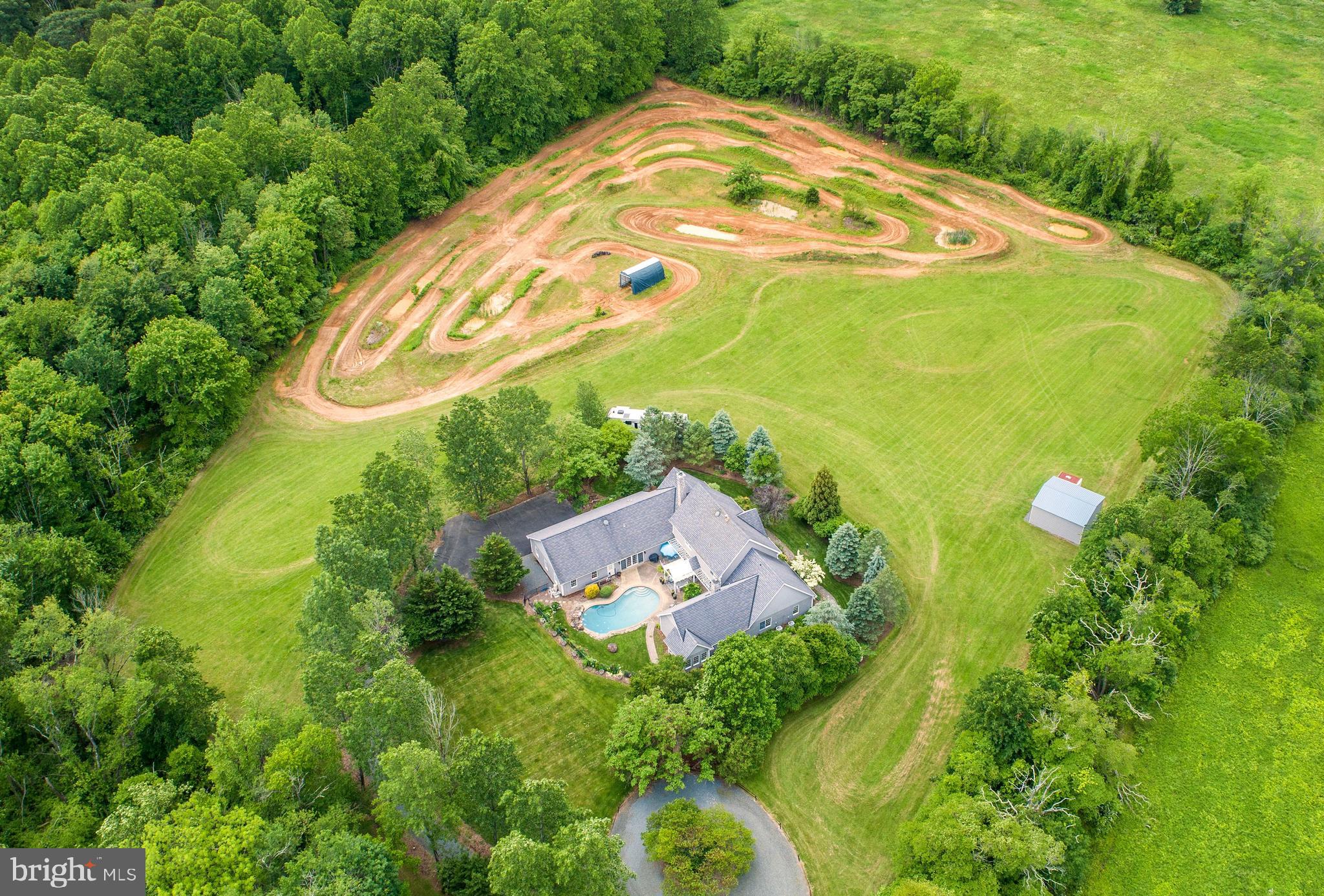 80 Linvale Road Ringoes, NJ 08551 - Photo 5 of 47 a view of a swimming pool with a yard