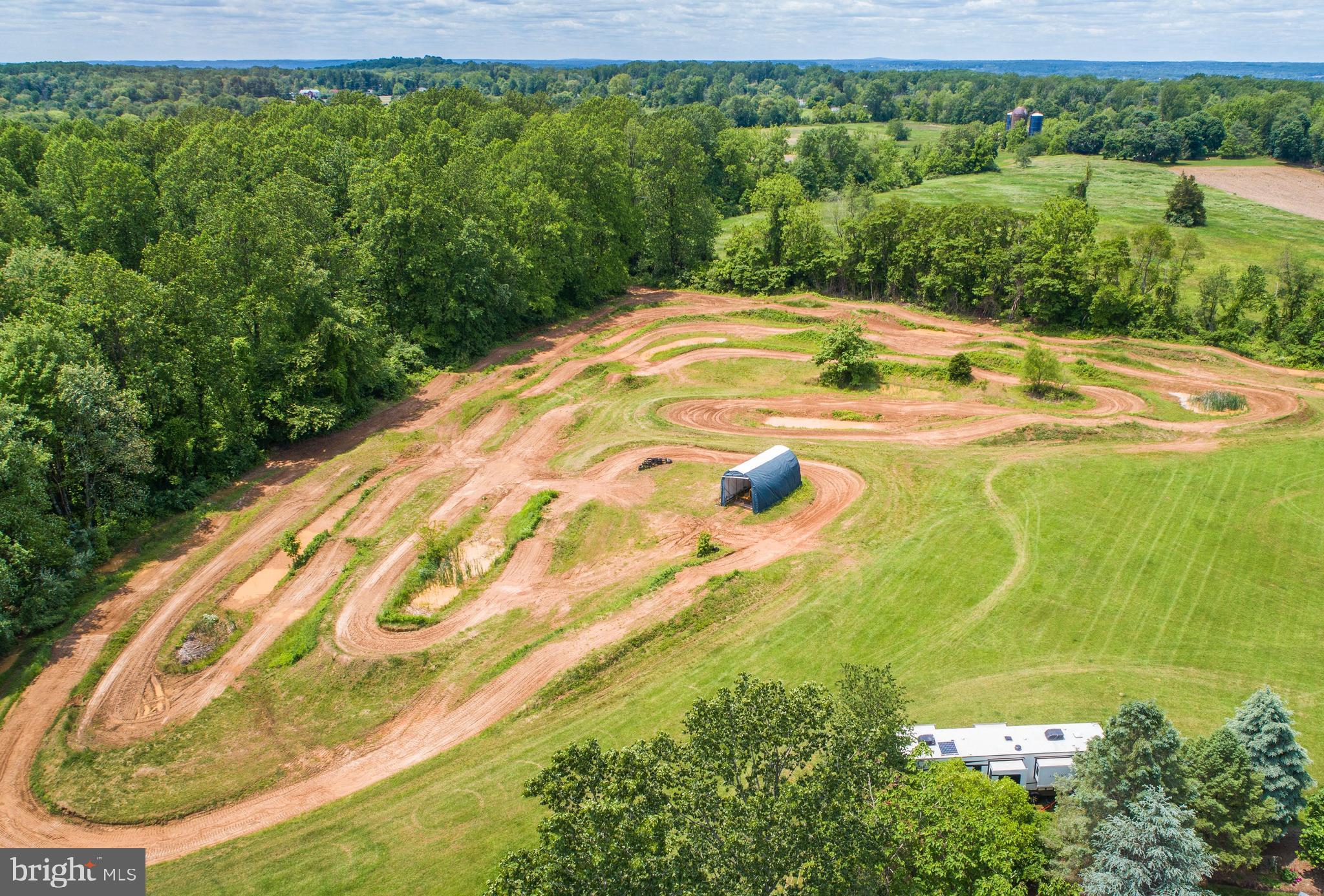 80 Linvale Road Ringoes, NJ 08551 - Photo 7 of 47 a view of swimming pool from a lake view