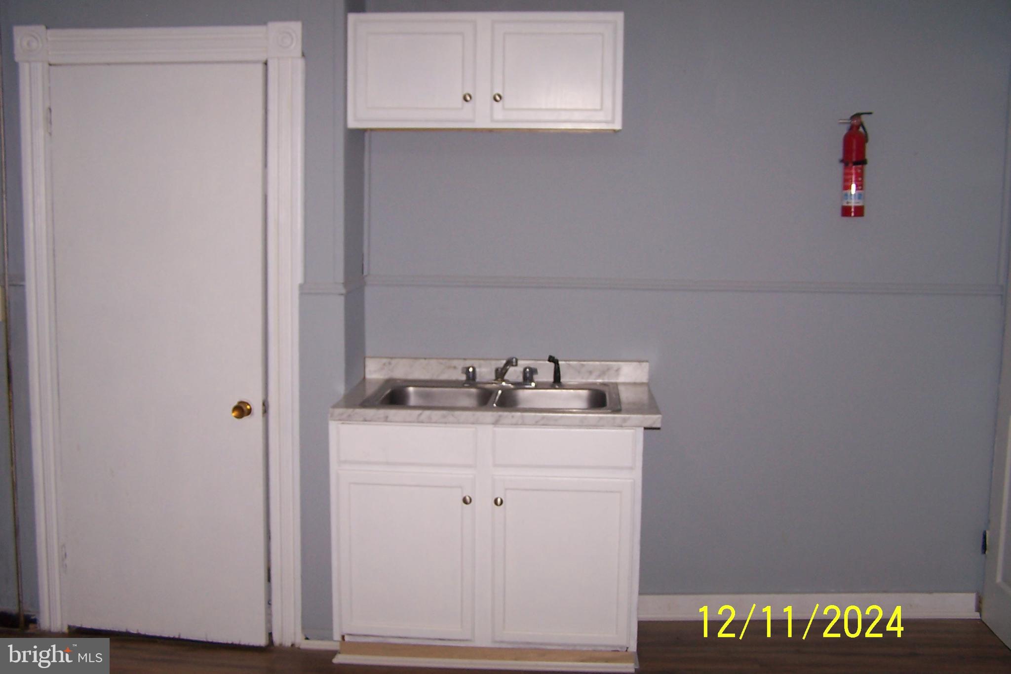 303 West Patterson Street Lansford, PA 18232 - Photo 8 of 22 a utility room with sink dryer and washer