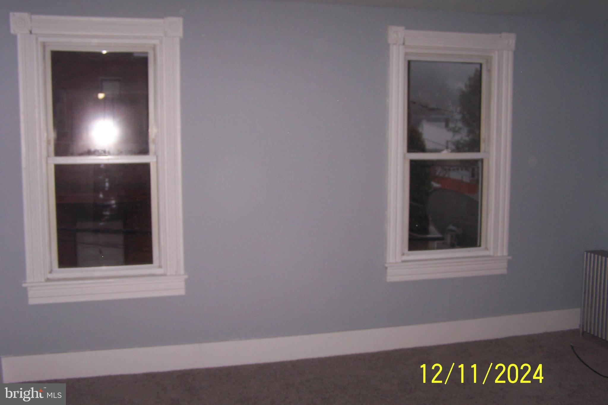 303 West Patterson Street Lansford, PA 18232 - Photo 9 of 22 an empty room with window
