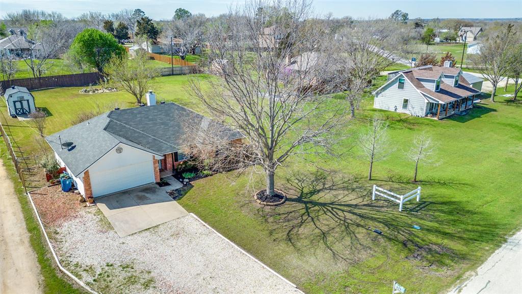 629 Concho Drive Oak Point, TX 75068 - Photo 3 of 35 an aerial view of a house with a yard basket ball court and outdoor seating