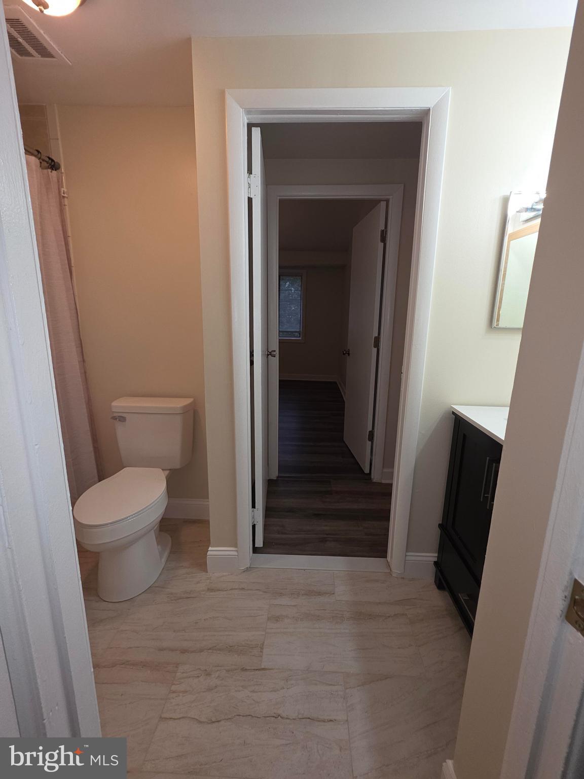 5407 Fallriver Row Court Columbia, MD 21044 - Photo 17 of 36 a bathroom with a toilet and a sink