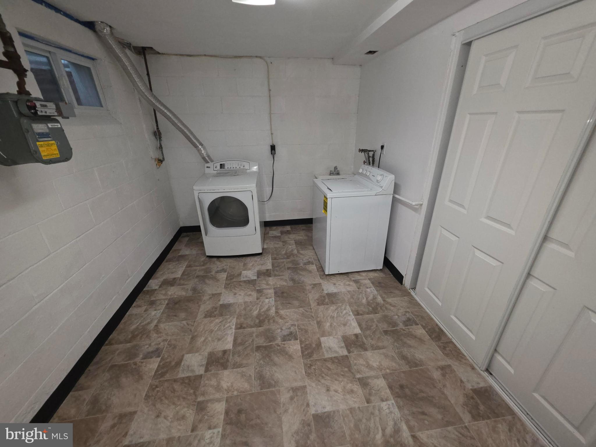 5407 Fallriver Row Court Columbia, MD 21044 - Photo 25 of 36 a bathroom with a sink and a toilet