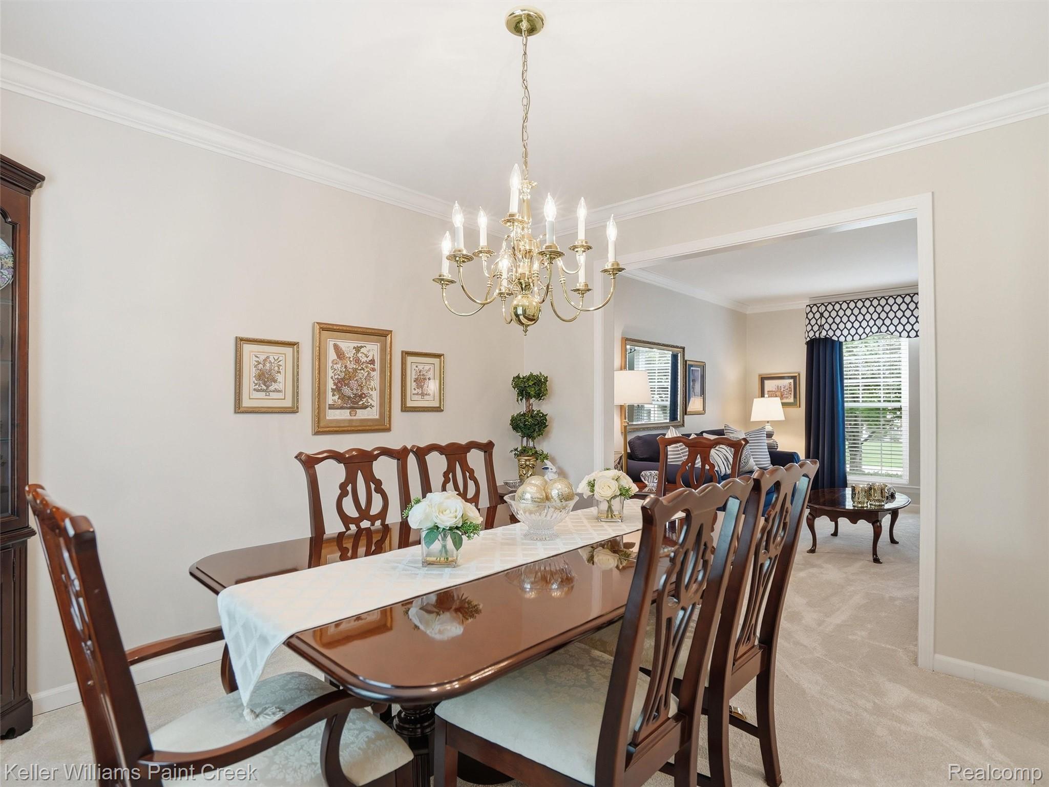 1351 West Fairview Lane Rochester, MI 48306 - Photo 20 of 65 Dining room featuring ornamental molding, light carpet, and suspended lighting
