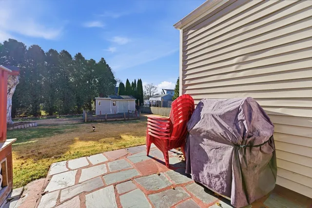a view of swimming pool with a lounge chair