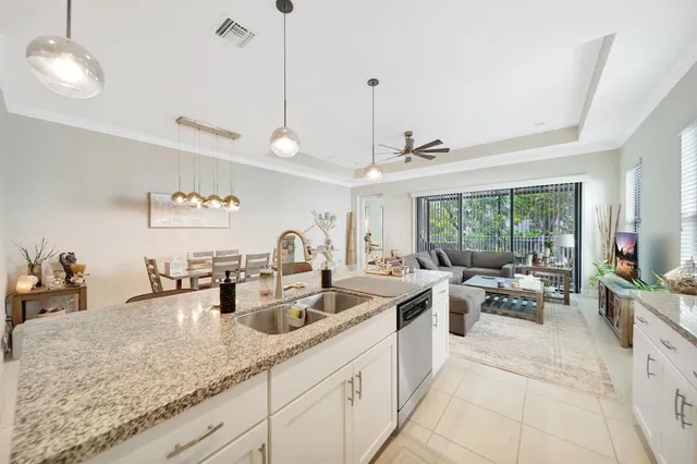 a large kitchen with a large window