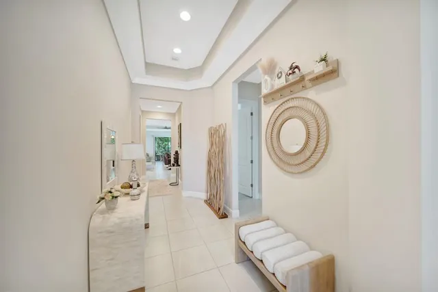 a view of a hallway with washer and dryer