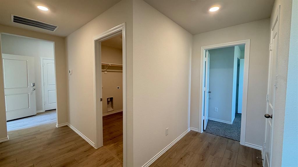 2007 Reveille Way Terrell, TX 75160 - Photo 15 of 31 a view of hallway with wooden floor