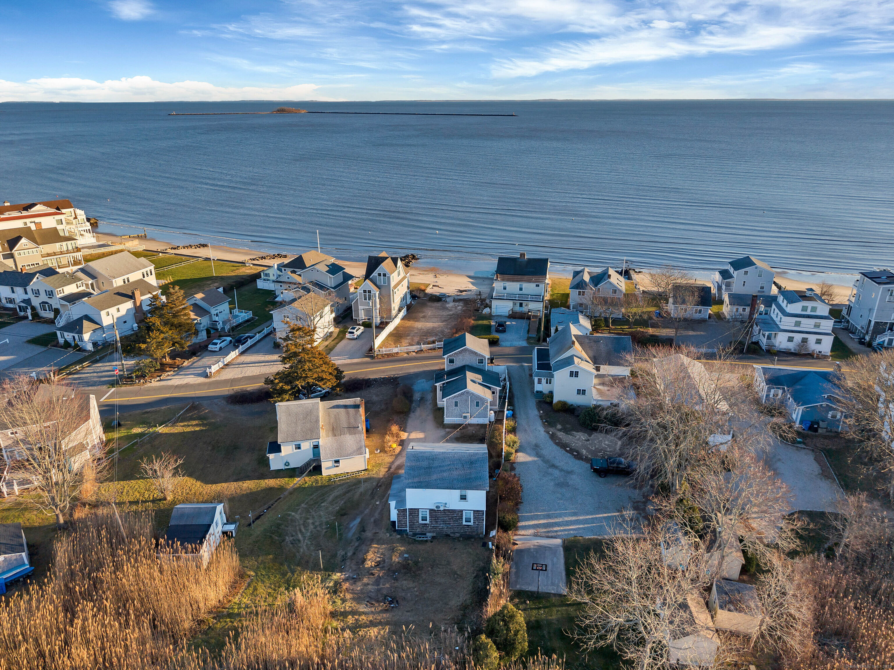 an aerial view of a house with a lake view