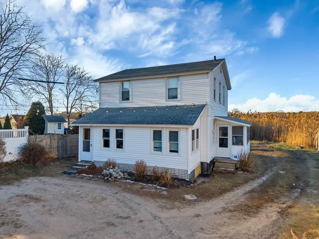 a house view with a backyard space