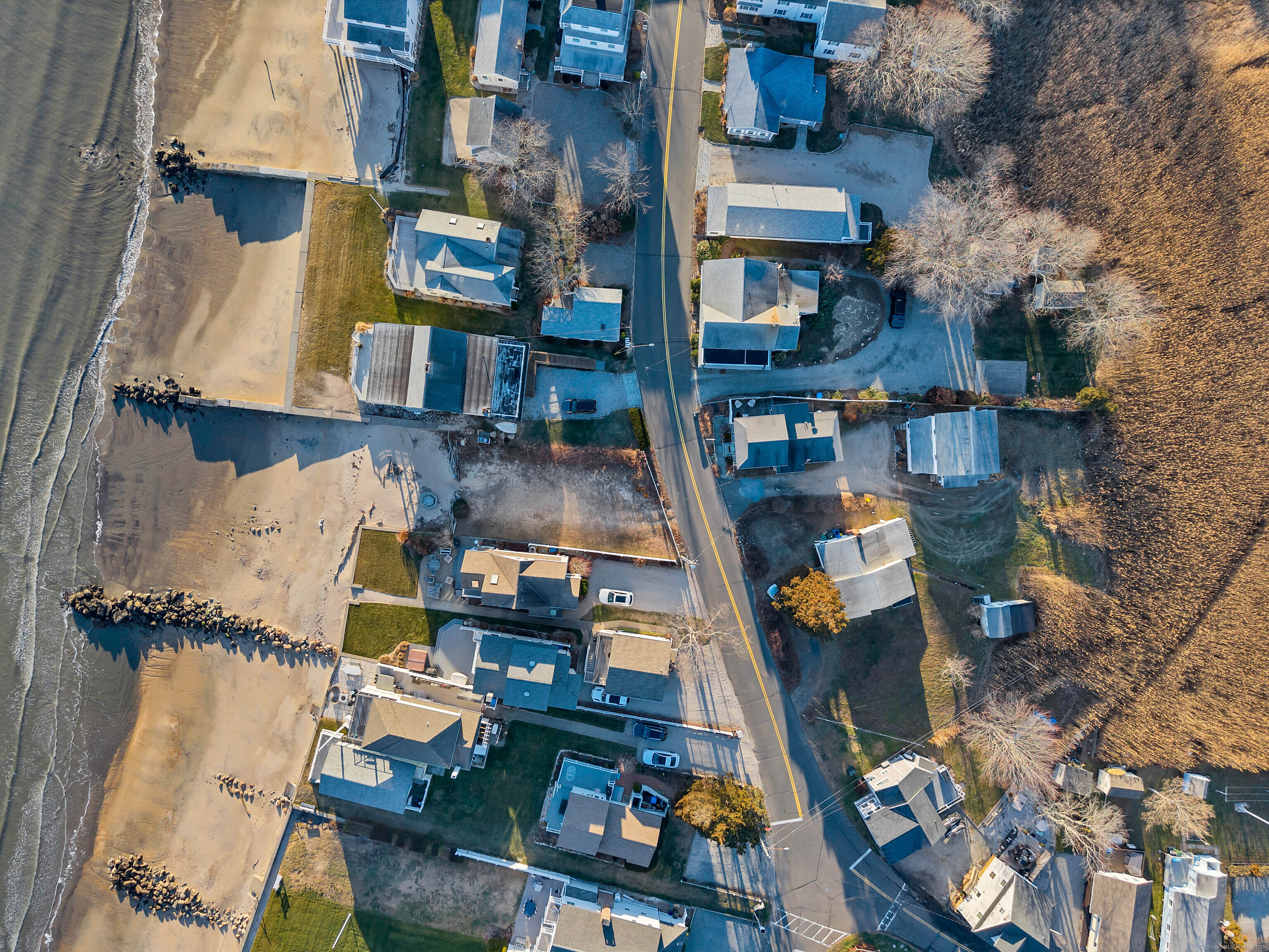 176 Shore Road, Unit B Clinton, CT 06413 - Photo 4 of 24 an aerial view of residential houses with outdoor space