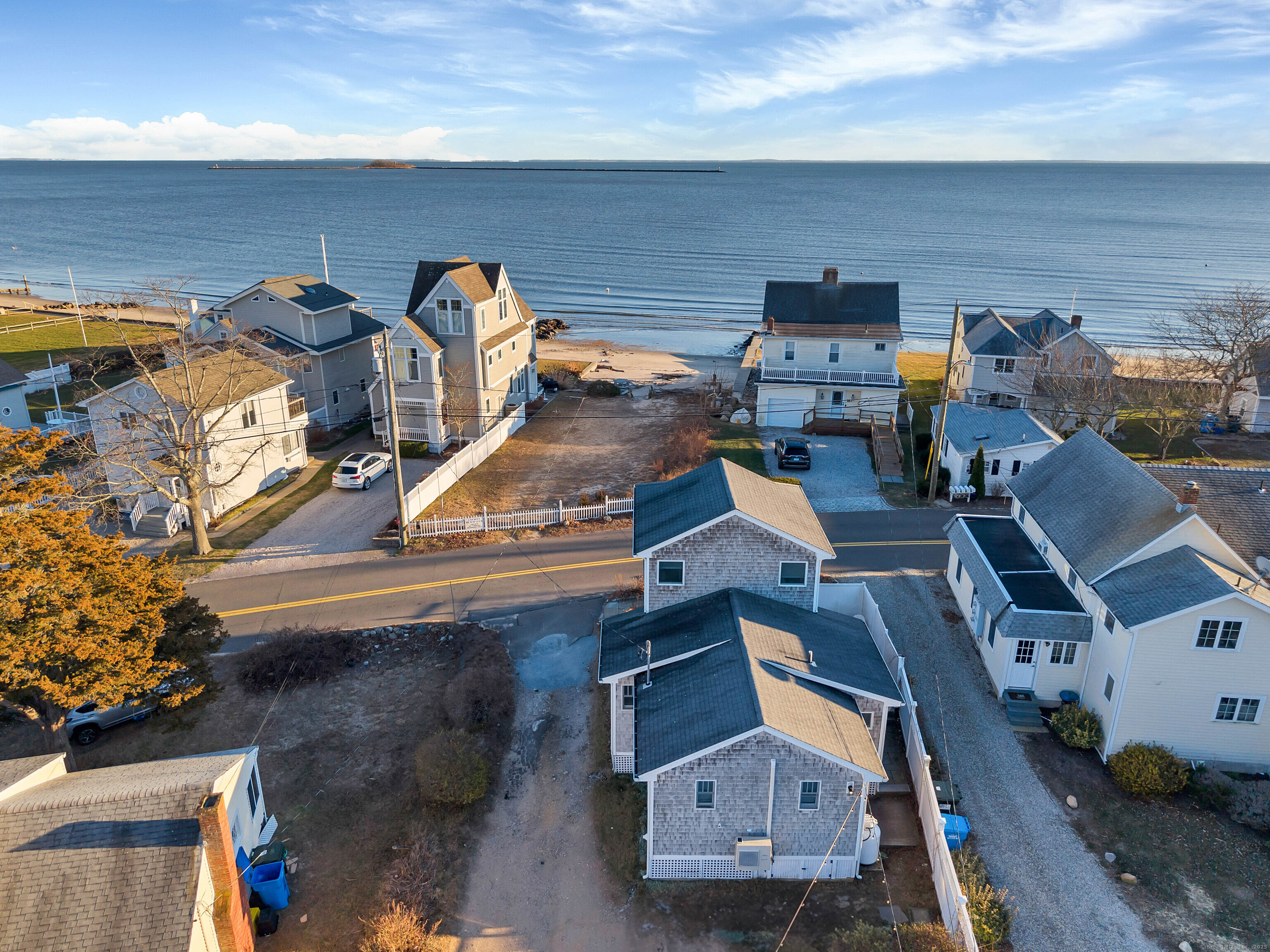 176 Shore Road, Unit B Clinton, CT 06413 - Photo 6 of 24 an aerial view of a house with outdoor space