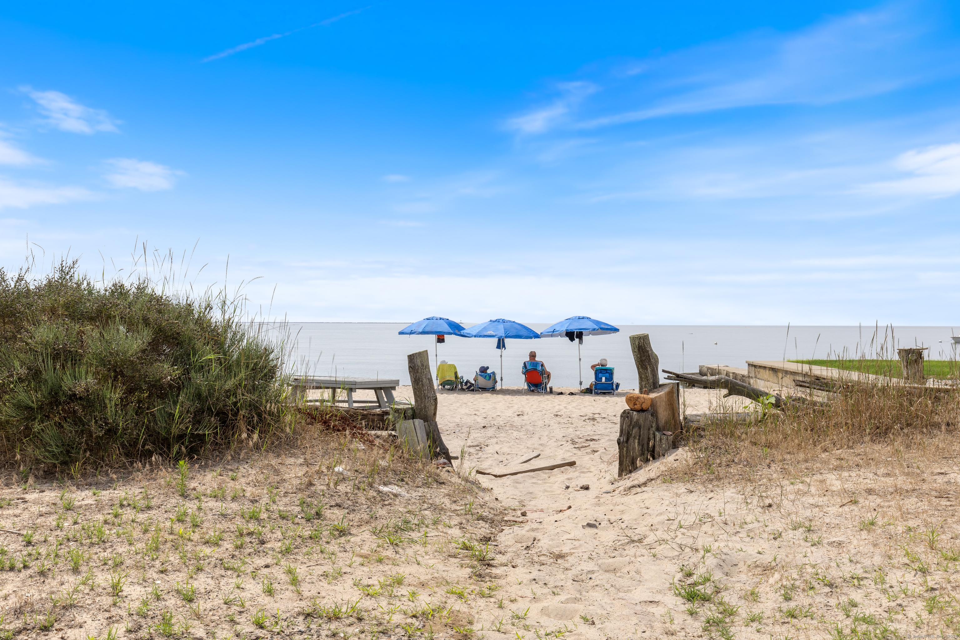 176 Shore Road, Unit B Clinton, CT 06413 - Photo 10 of 24 a view of a dry yard with wooden fence