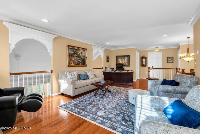 a bedroom with a bed and a lamp