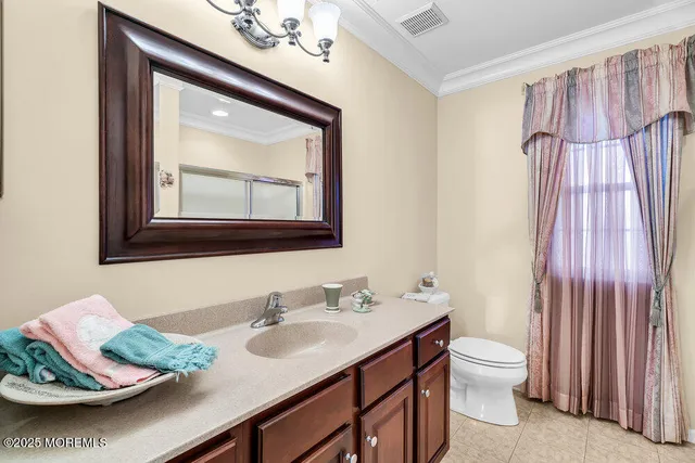 a view of a backyard with plants and garden