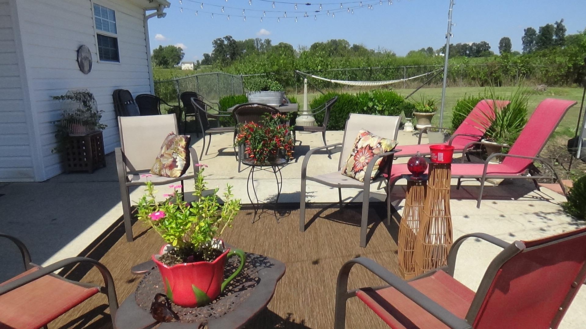 1126 Maxwell Branch Road Cottontown, TN 37048 - Photo 23 of 27 a view of a chairs and table in the terrace