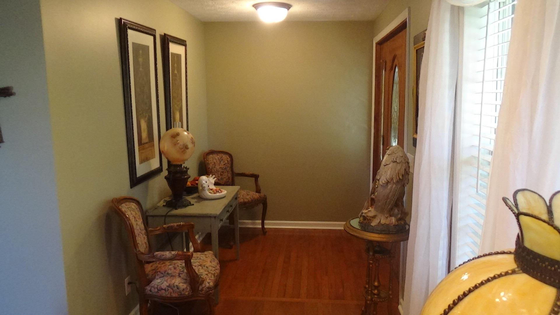 1126 Maxwell Branch Road Cottontown, TN 37048 - Photo 6 of 27 a view of a room that has a bed and a chair in it
