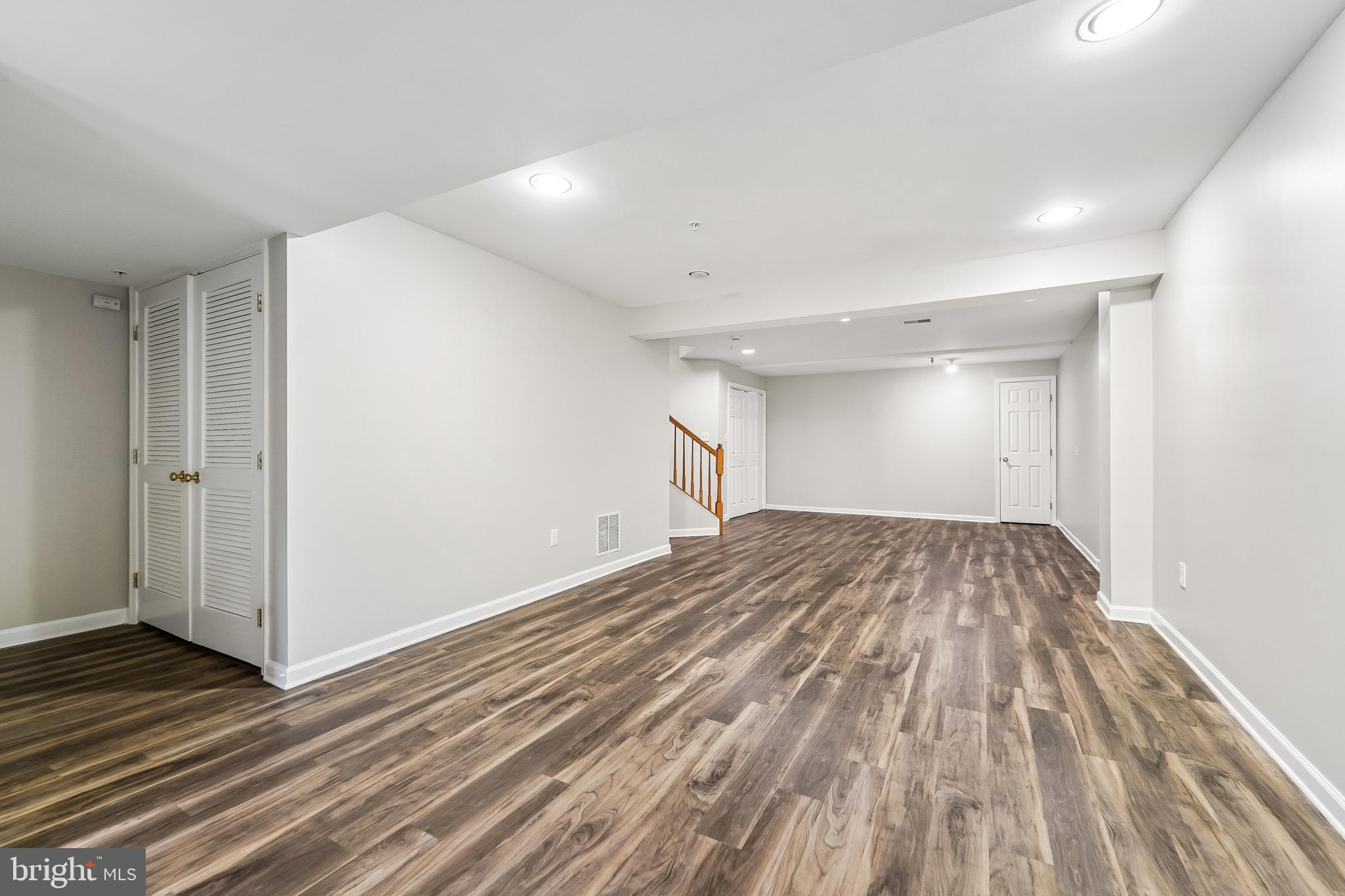 1461 Pangbourne Way Hanover, MD 21076 - Photo 36 of 51 a view of a room with wooden floor