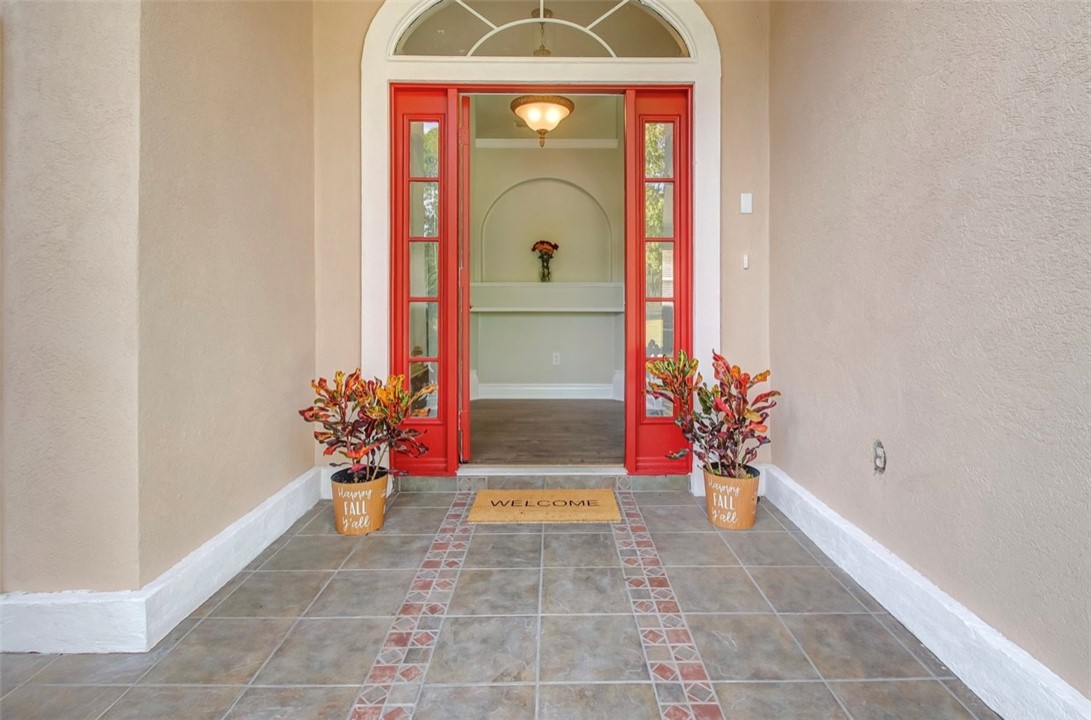 96372 Green Pine Road Yulee, FL 32097 - Photo 3 of 28 a view of a entryway door of the house
