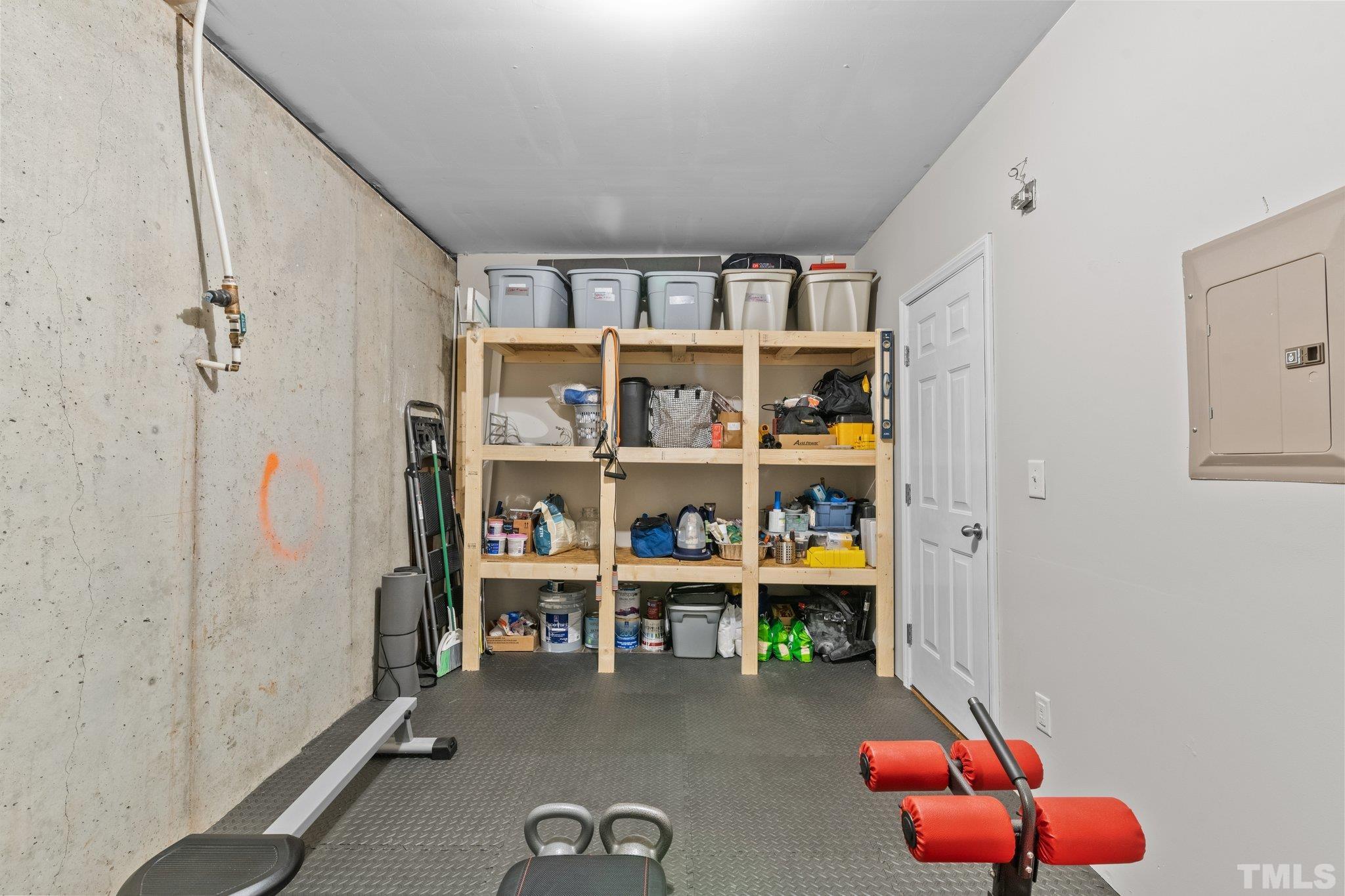 7882 Spungold Street Raleigh, NC 27617 - Photo 25 of 27 a room with toys and book shelf