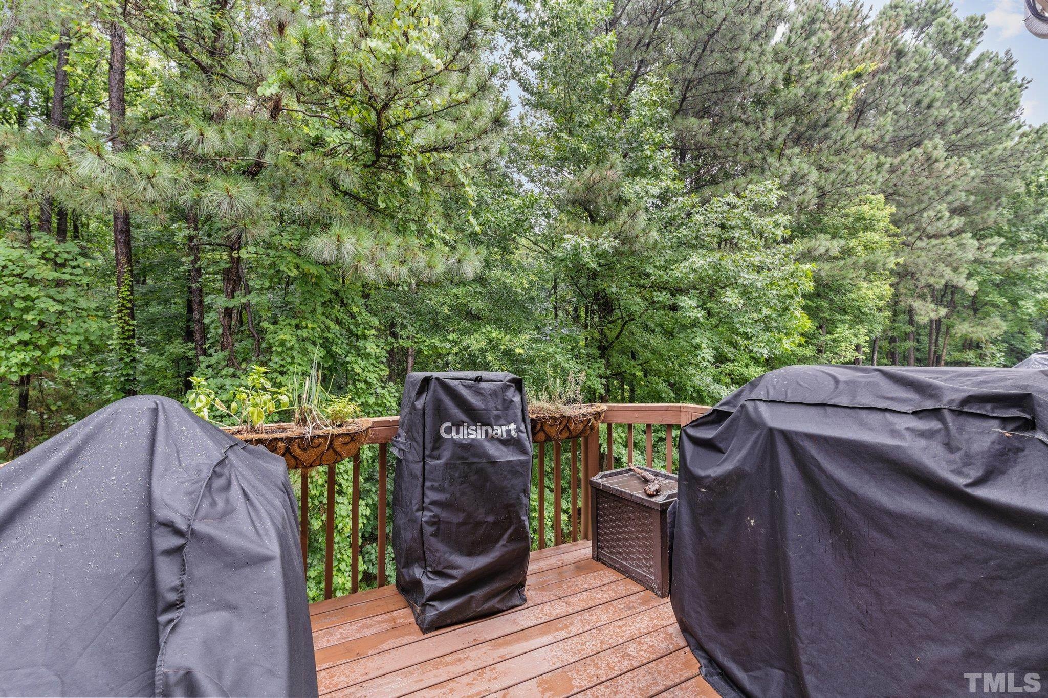 7882 Spungold Street Raleigh, NC 27617 - Photo 26 of 27 a view of deck and hardwood