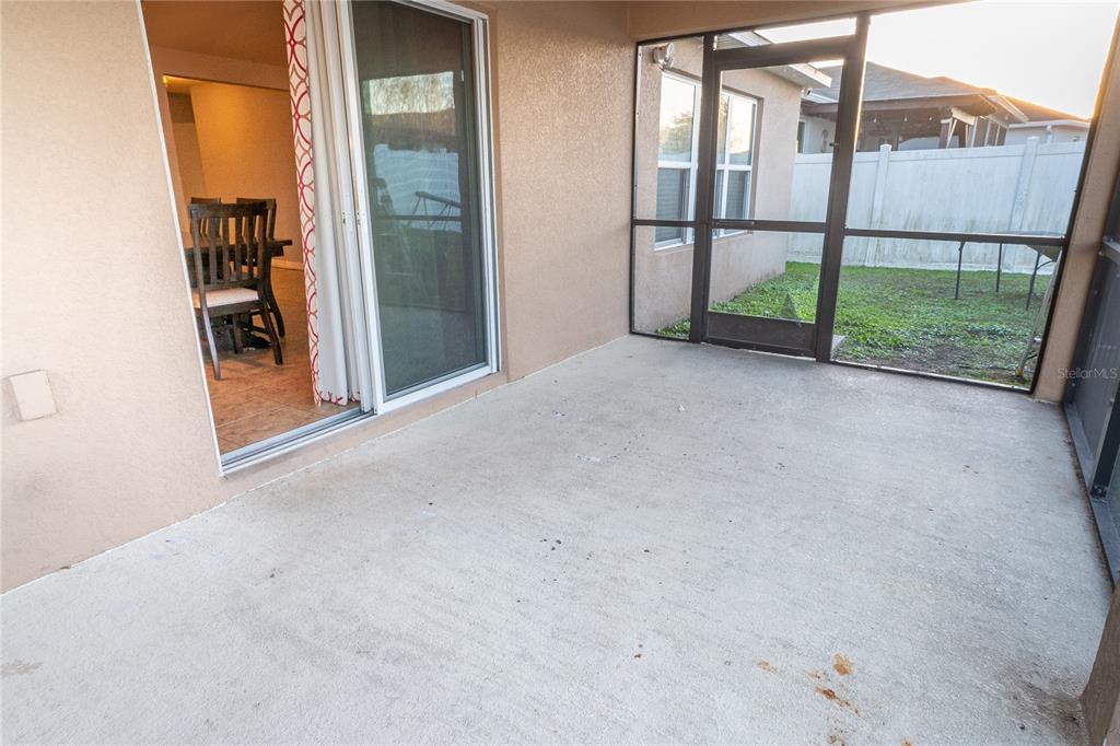 4563 Orchard Grove Road St. Cloud, FL 34772 - Photo 46 of 51 a view of a house with a street