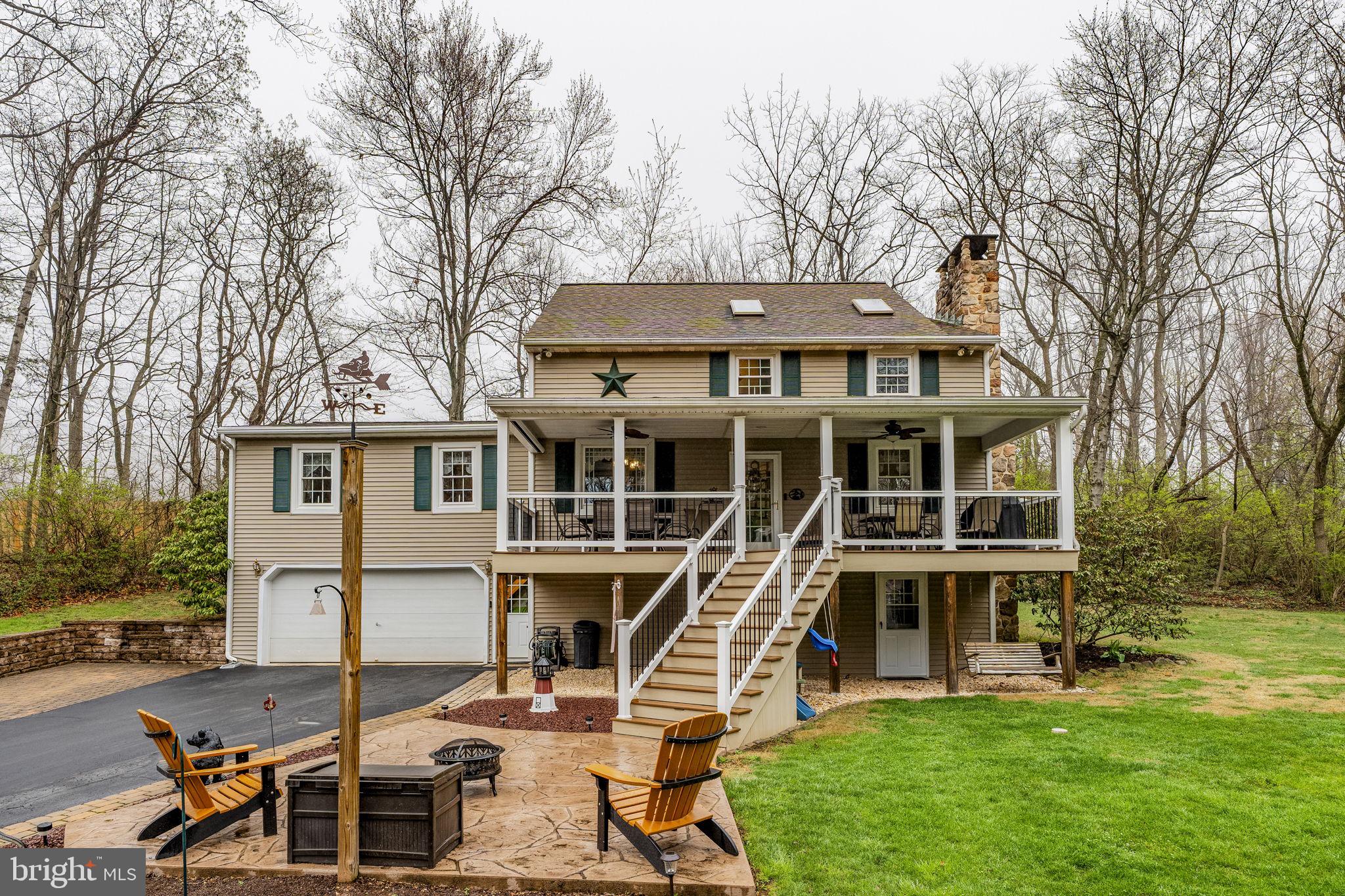 1195 Seglock Road Stevens, PA 17578 - Photo 1 of 33 a front view of a house with a yard