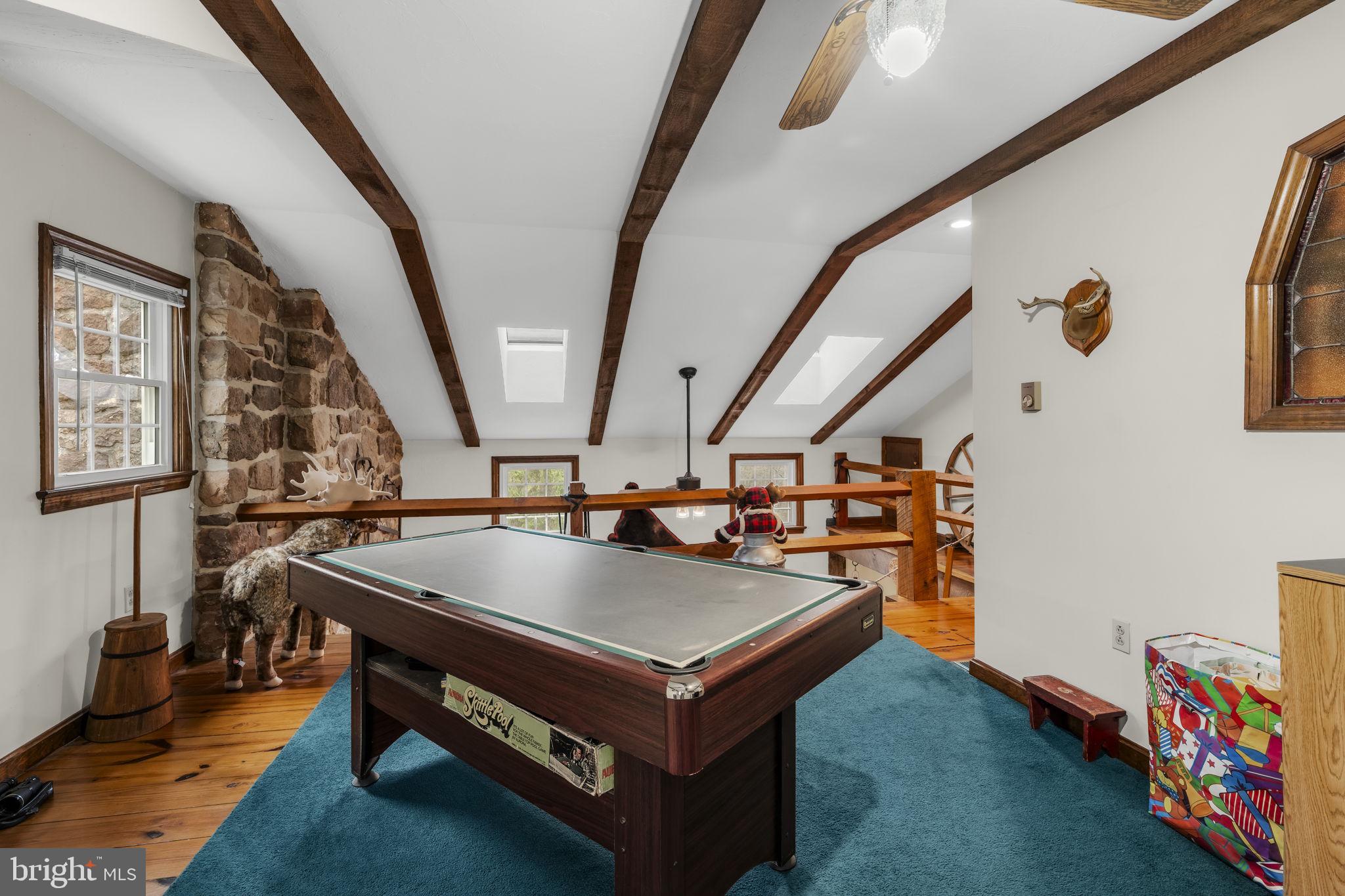 1195 Seglock Road Stevens, PA 17578 - Photo 16 of 33 a living room with furniture and a flat screen tv