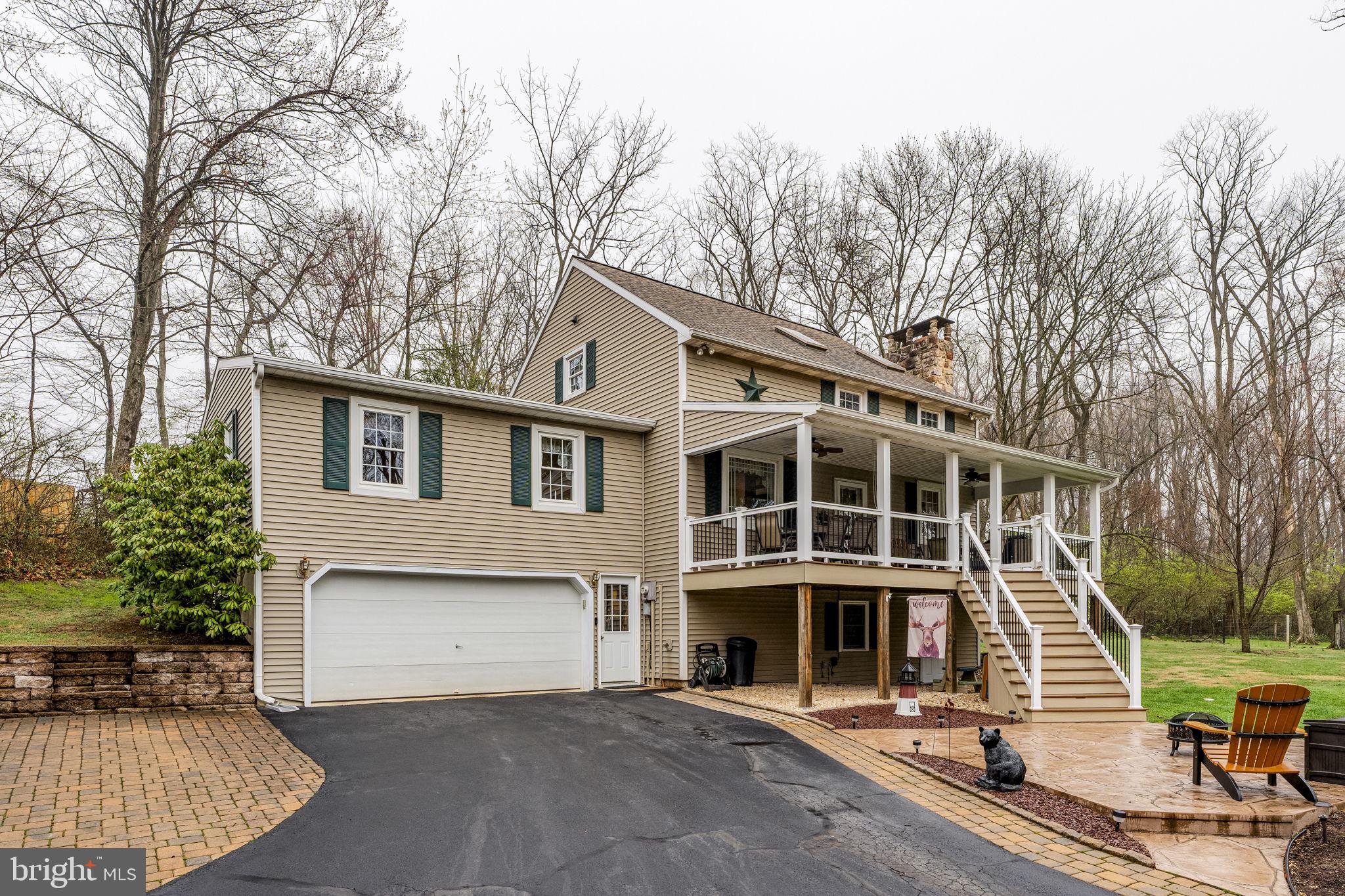 1195 Seglock Road Stevens, PA 17578 - Photo 2 of 33 a front view of a house with garage