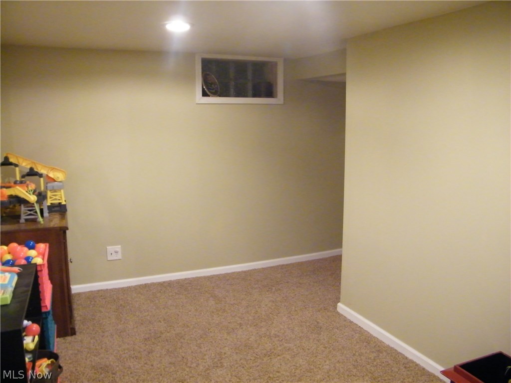 734 Ranney Street Akron, OH 44310 - Photo 31 of 31 Glass block windows and extra living space in the basement.