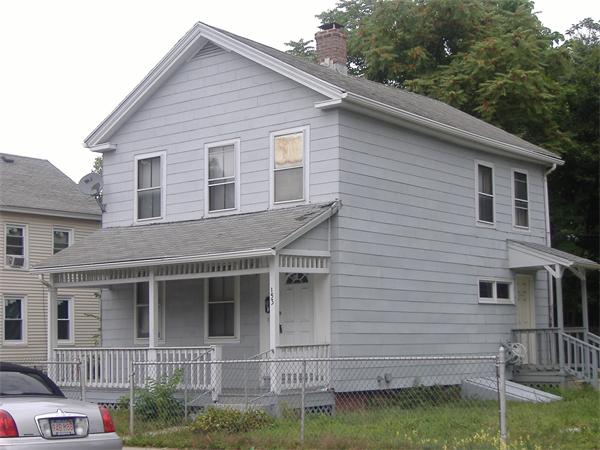 153 Hancock Street Springfield, MA 01109 - Photo 1 of 1 a view of a house with a yard